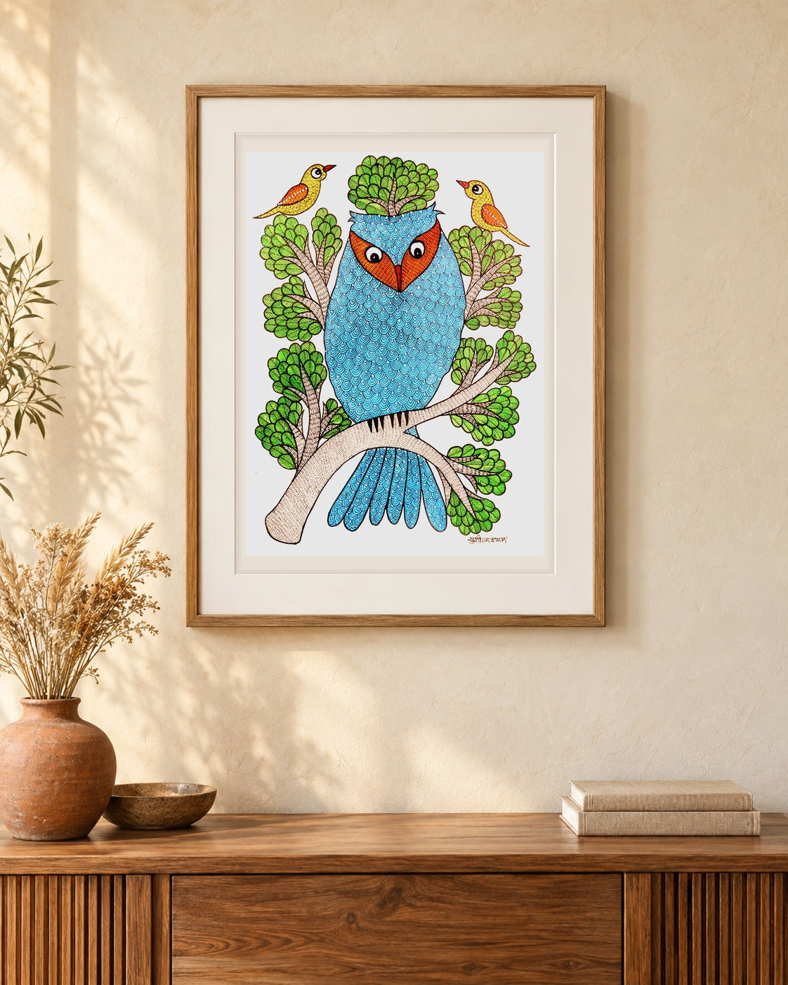 Original Gond painting shown framed on a wall