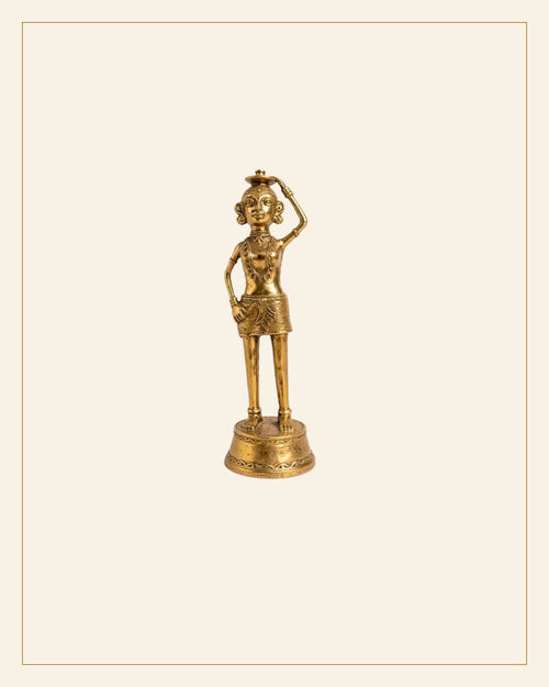 Handcrafted Bhareva Brass Tribal Woman with Weeding Knife Showpiece — Saptadhārā