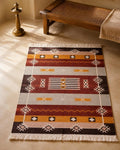Styled image: Rangrez Punja Durrie Floor Rug · Handwoven Rug in a styled setting