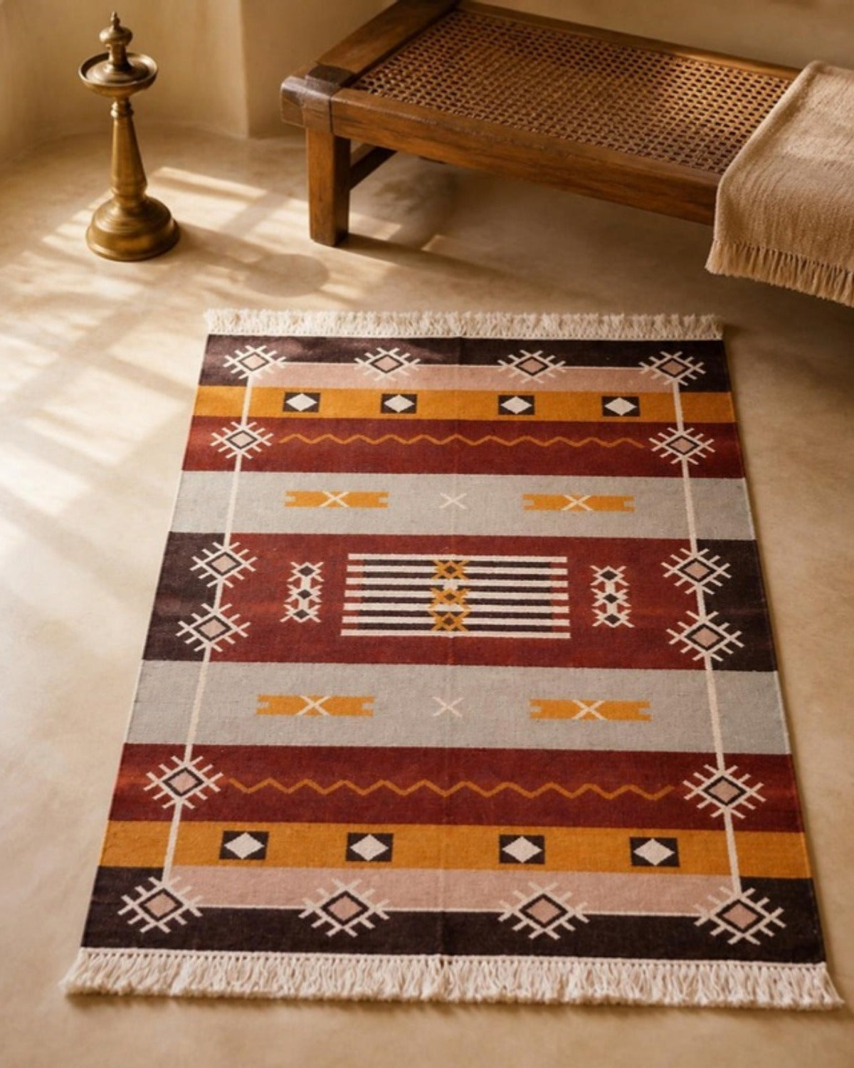 Styled image: Rangrez Punja Durrie Floor Rug · Handwoven Rug in a styled setting