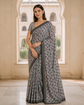 Styled image: model wearing the Dhuan Batik Cotton Saree
