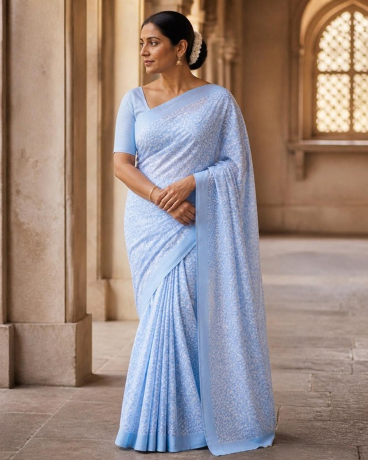 Styled image: model wearing the Neel Batik Cotton Saree