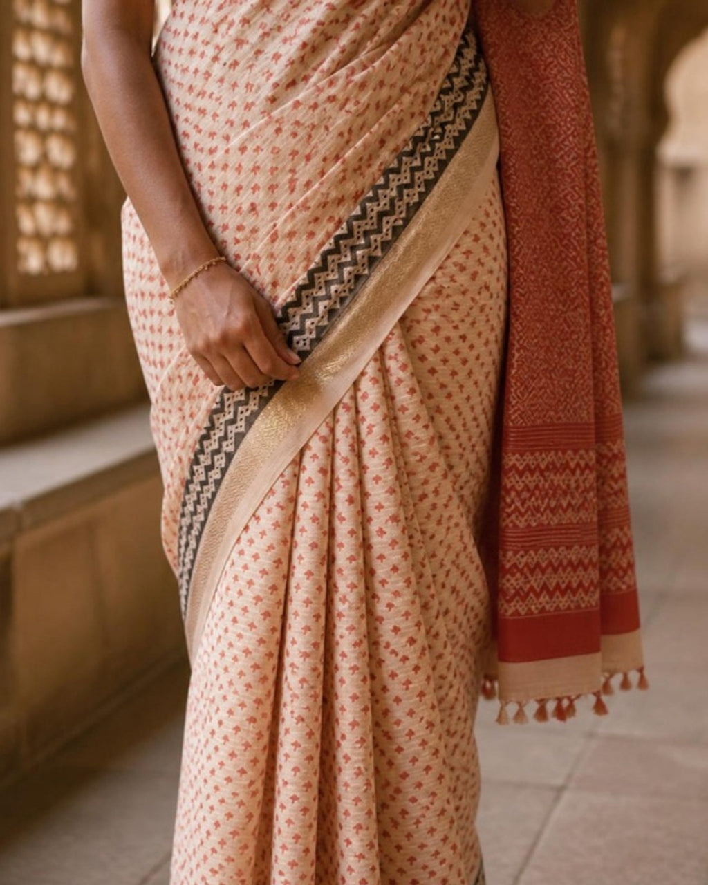 Styled image: Sindoori Bagh Print Cotton Saree, border and pleats