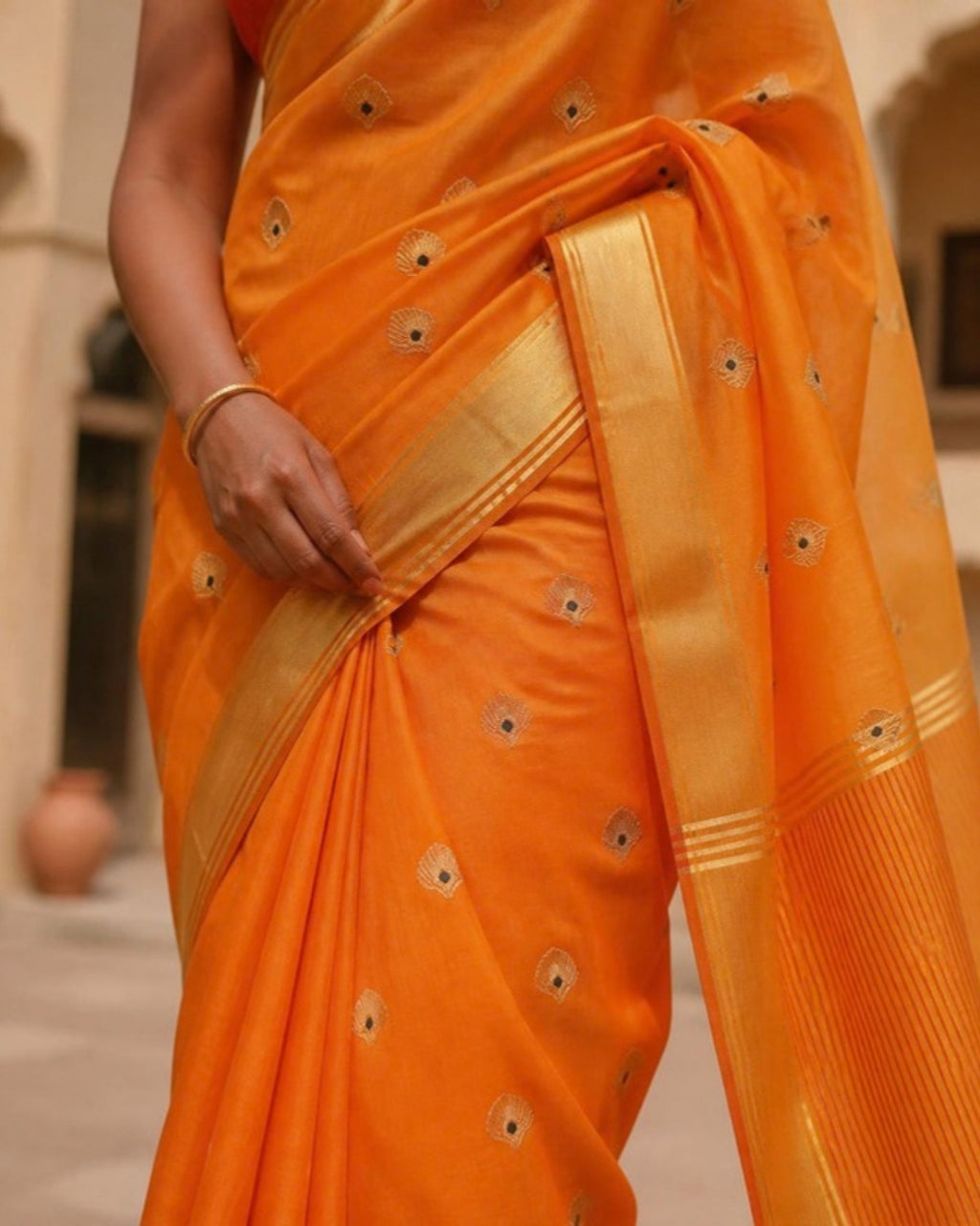 Styled image: Haldi Chanderi Silk & Cotton Saree with Meena Butis, border and pleats