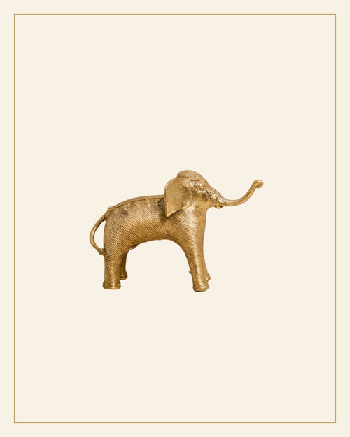 Handcrafted Bhareva Bell Metal Elephant Figurine – Tribal Heritage Decorative Showpiece — Saptadhārā