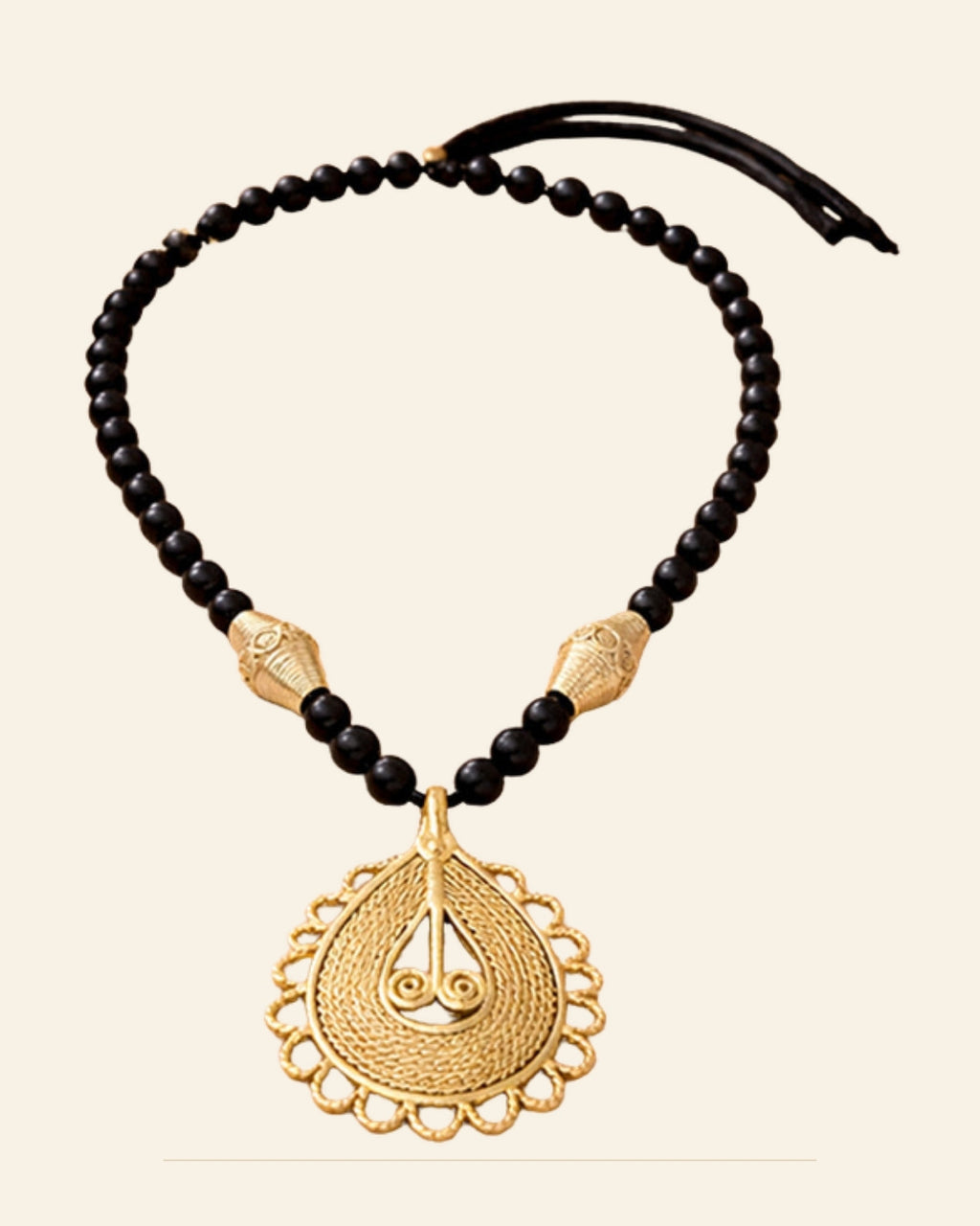 Handcrafted Bell Metal Teardrop Pendant Necklace Set with Black Beads – Antique Finish — Saptadhārā studio