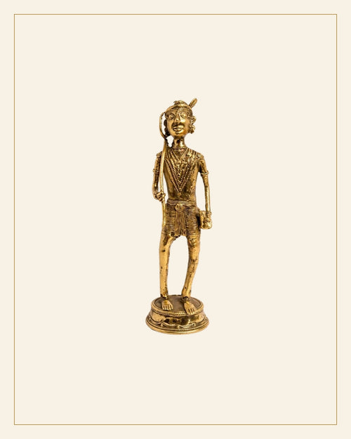 Handcrafted Brass Tribal Warrior Figurine – Traditional Bhareva Bell Metal Sculpture — Saptadhārā