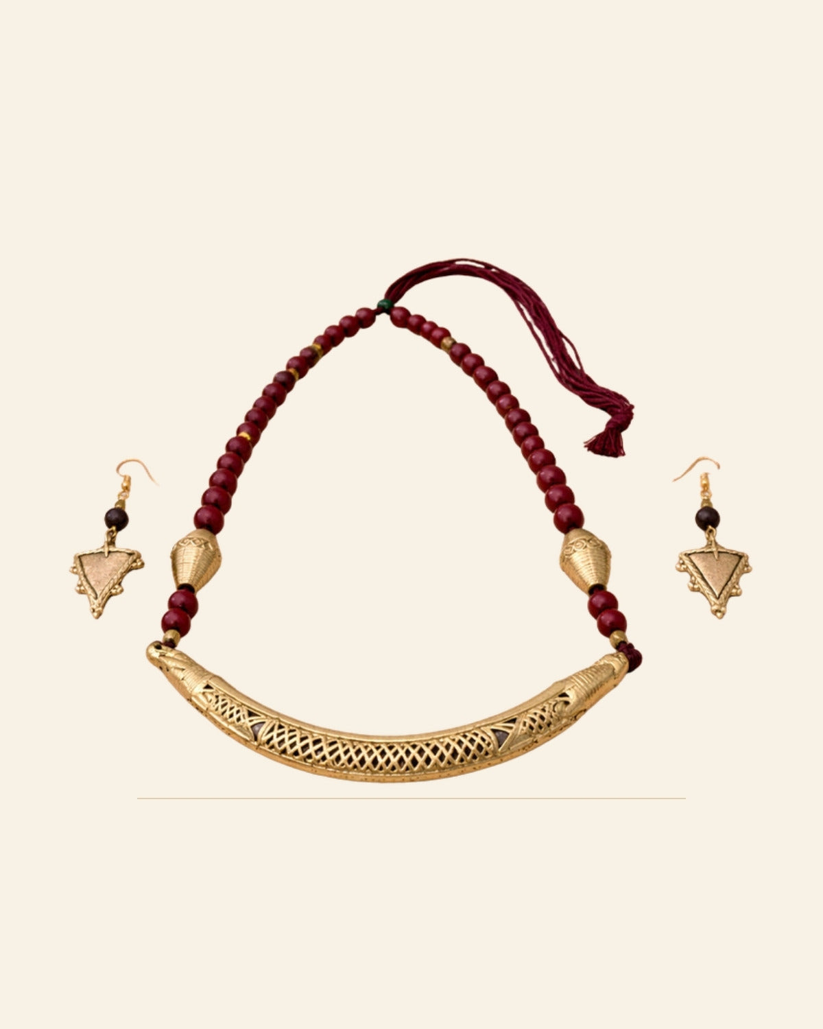 Handcrafted Bell Metal Crescent Bar Necklace Set with Red Beads – Antique Finish — Saptadhārā studio