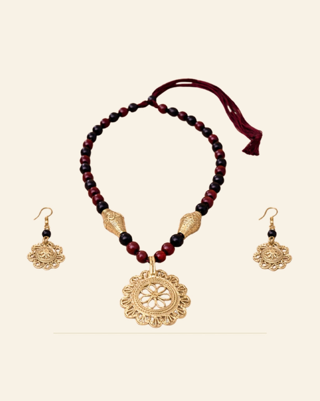 Handcrafted Bell Metal Floral Pendant Necklace Set with Maroon & Black Beads – Antique Finish — Saptadhārā studio
