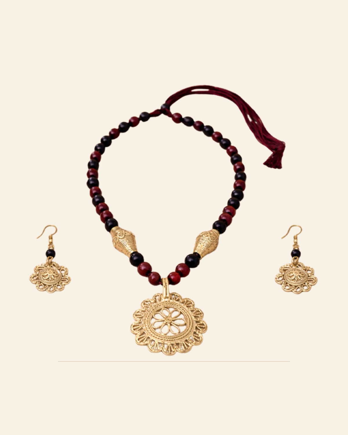 Handcrafted Bell Metal Floral Pendant Necklace Set with Maroon & Black Beads – Antique Finish — Saptadhārā studio