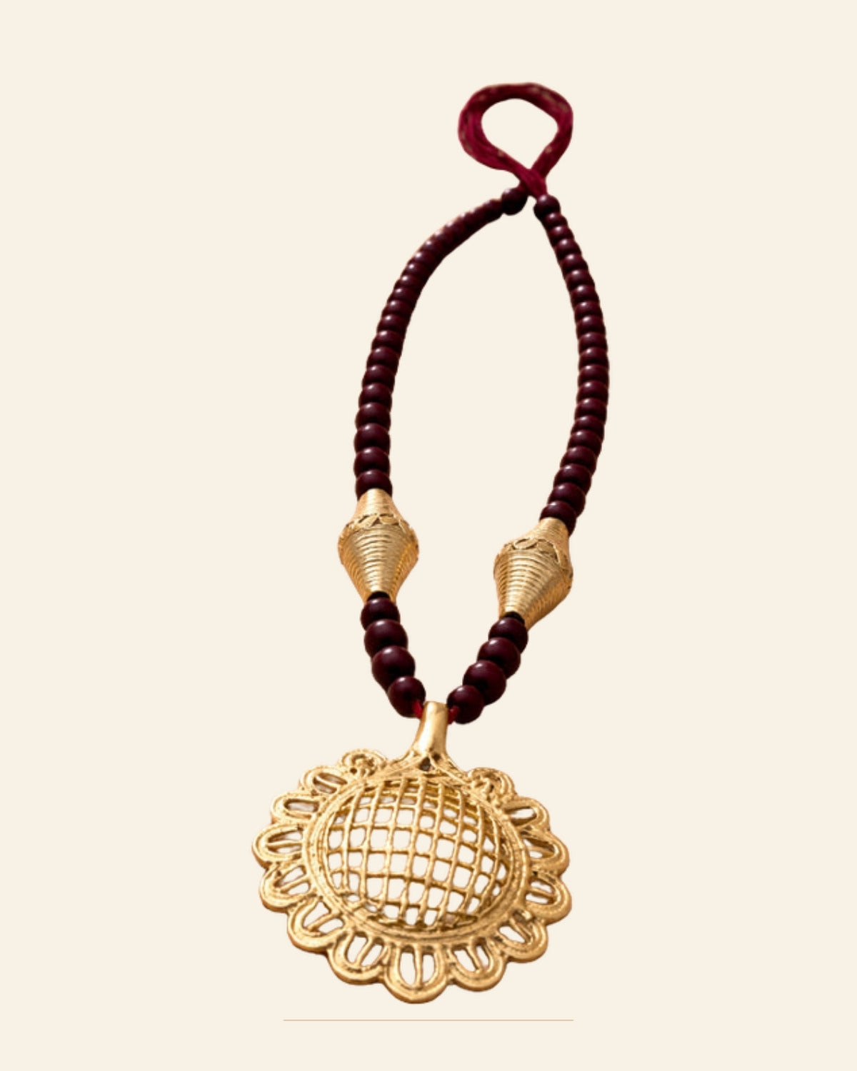 Handcrafted Bell Metal Pendant Necklace Set with Maroon Beads – Antique Finish — Saptadhārā studio