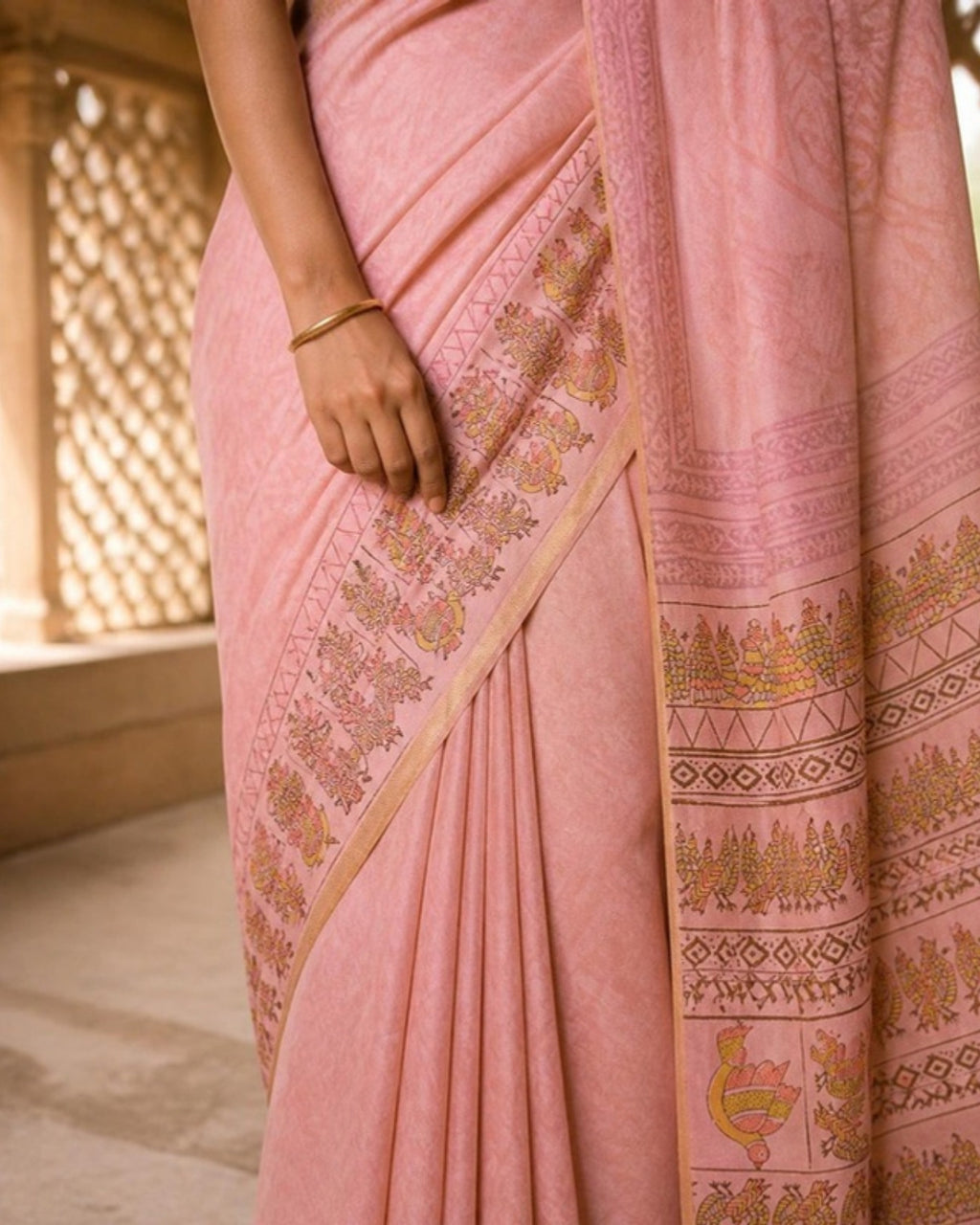 Styled image: Gulabi Gond Art Saree with Gond Motifs, border and pleats