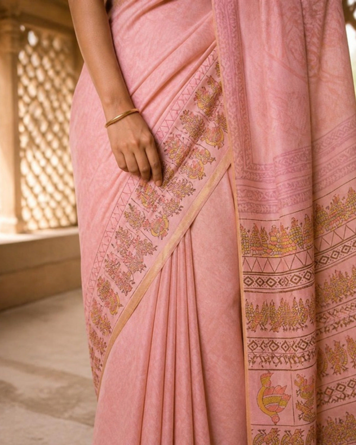 Styled image: Gulabi Gond Art Saree with Gond Motifs, border and pleats