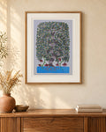 Original Gond painting shown framed on a wall