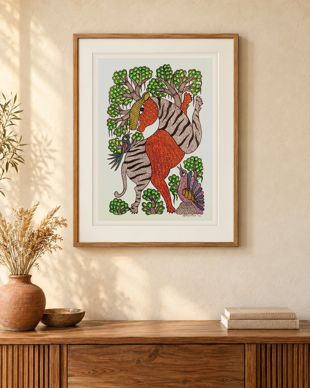 Original Gond painting shown framed on a wall