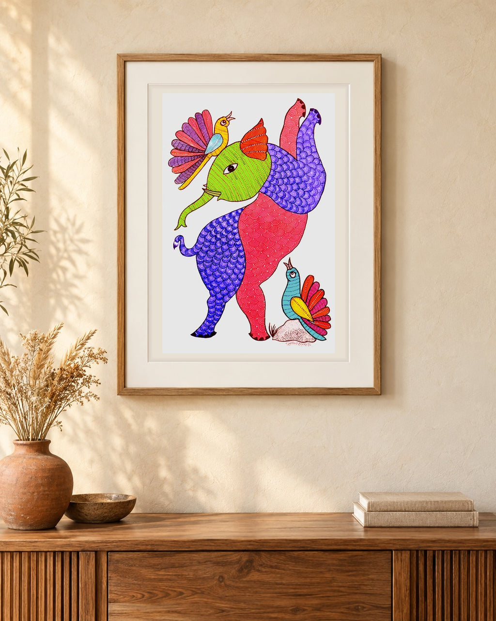 Original Gond painting shown framed on a wall
