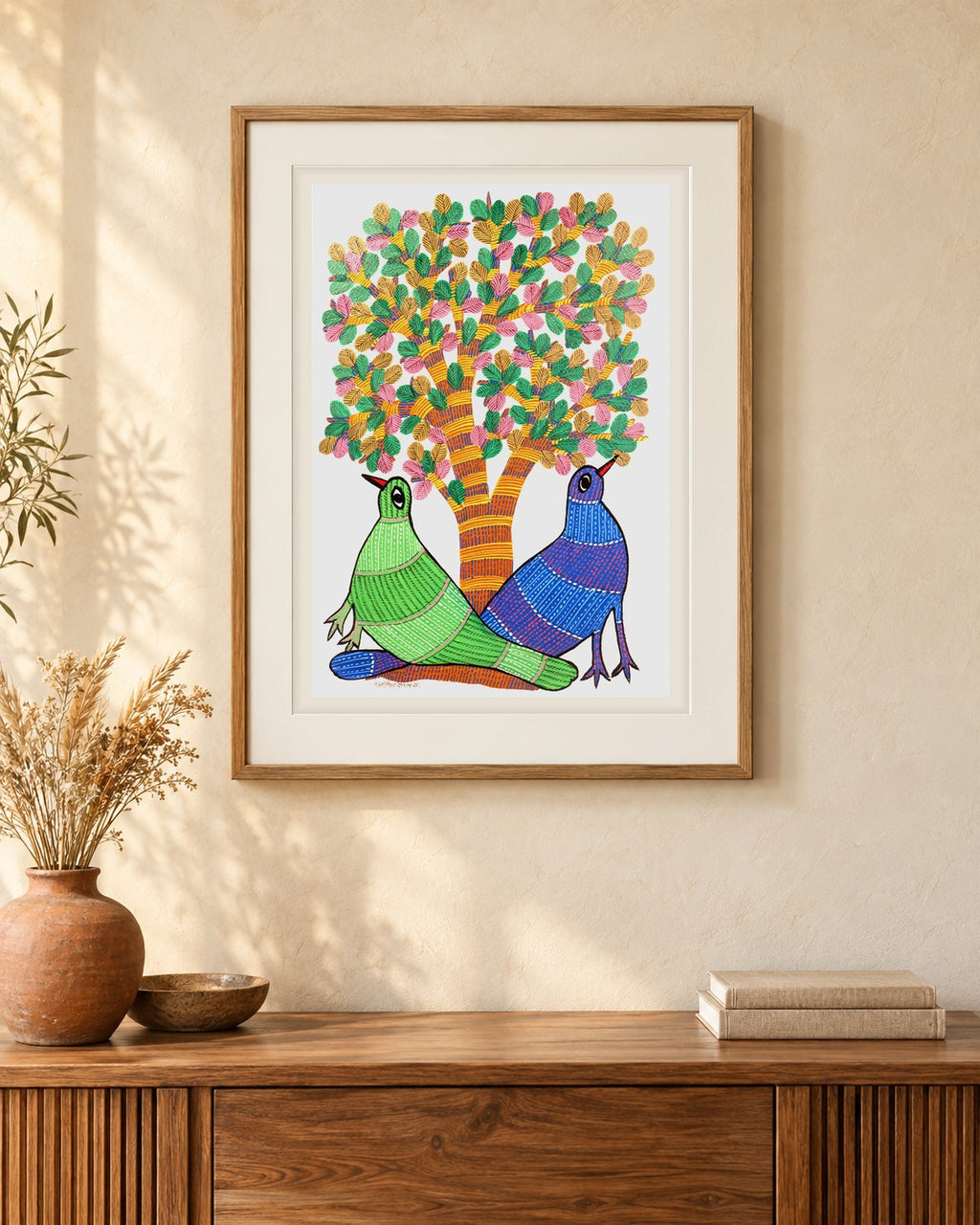 Original Gond painting shown framed on a wall