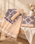Styled photograph of the unstitched dress material set