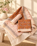 Styled photograph of the unstitched dress material set
