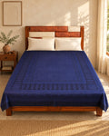 Hand block printed bedsheet styled in a bedroom