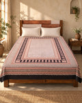 Hand block printed bedsheet styled in a bedroom