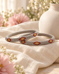 Styled image: Dhuan Beaded Bangles on linen