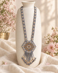 Styled image: Dhuan Geometric Beaded Mangalsutra Set on a white vase