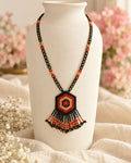 Styled image: Shyam Long Beaded Mangalsutra Set on a white vase