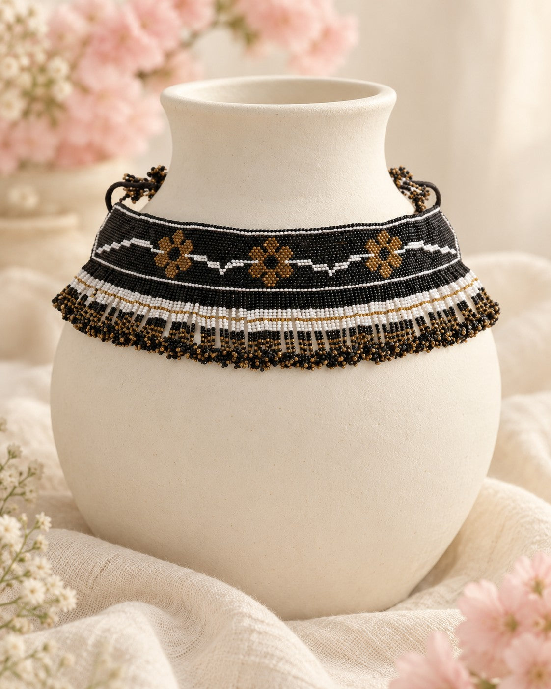 Styled image: Shyam Beaded Choker Necklace Set on a white vase