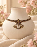 Styled image: Kattha Geometric Beaded Choker Necklace Set on a white vase
