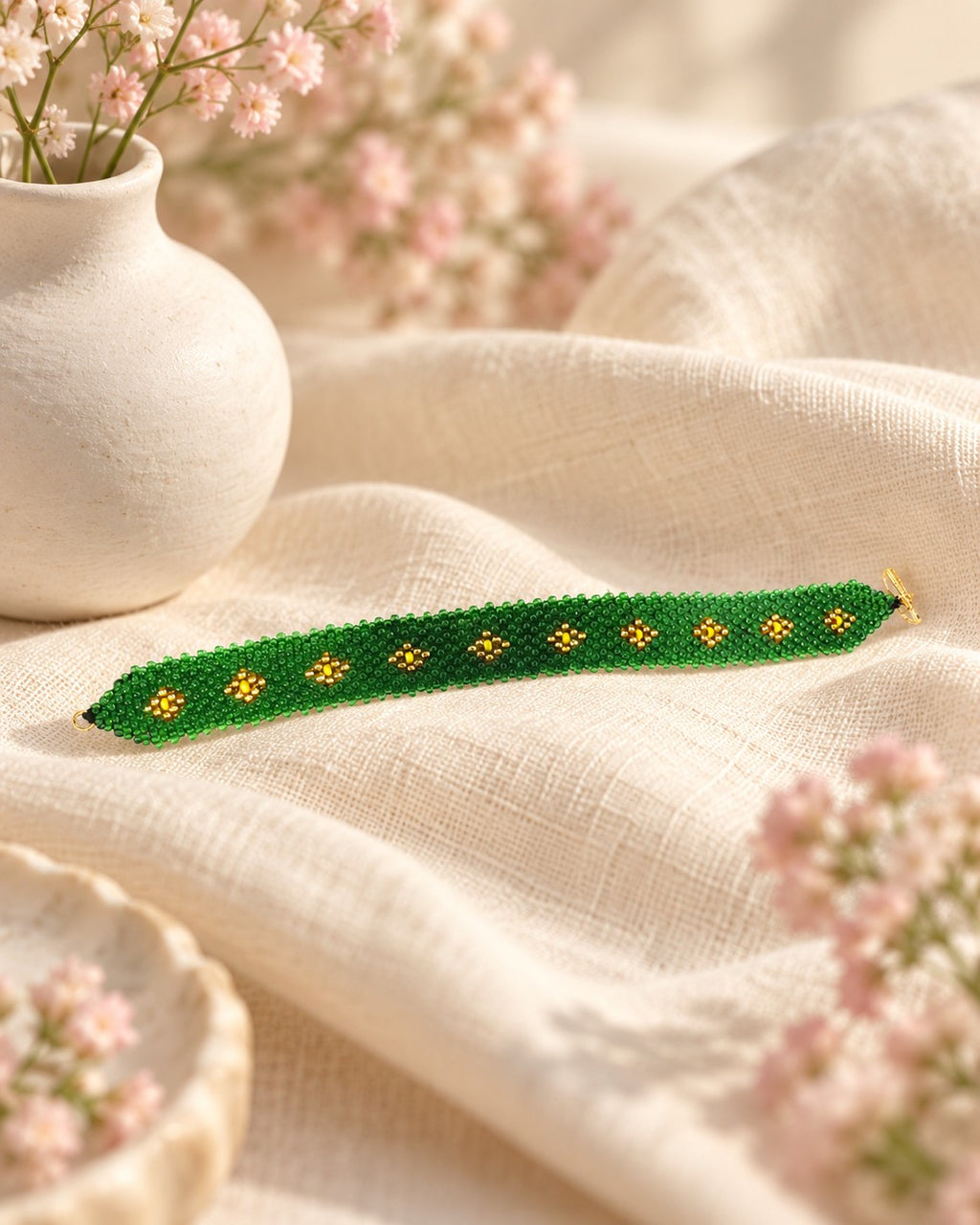 Styled image: Sona Green Beaded Bracelet on linen