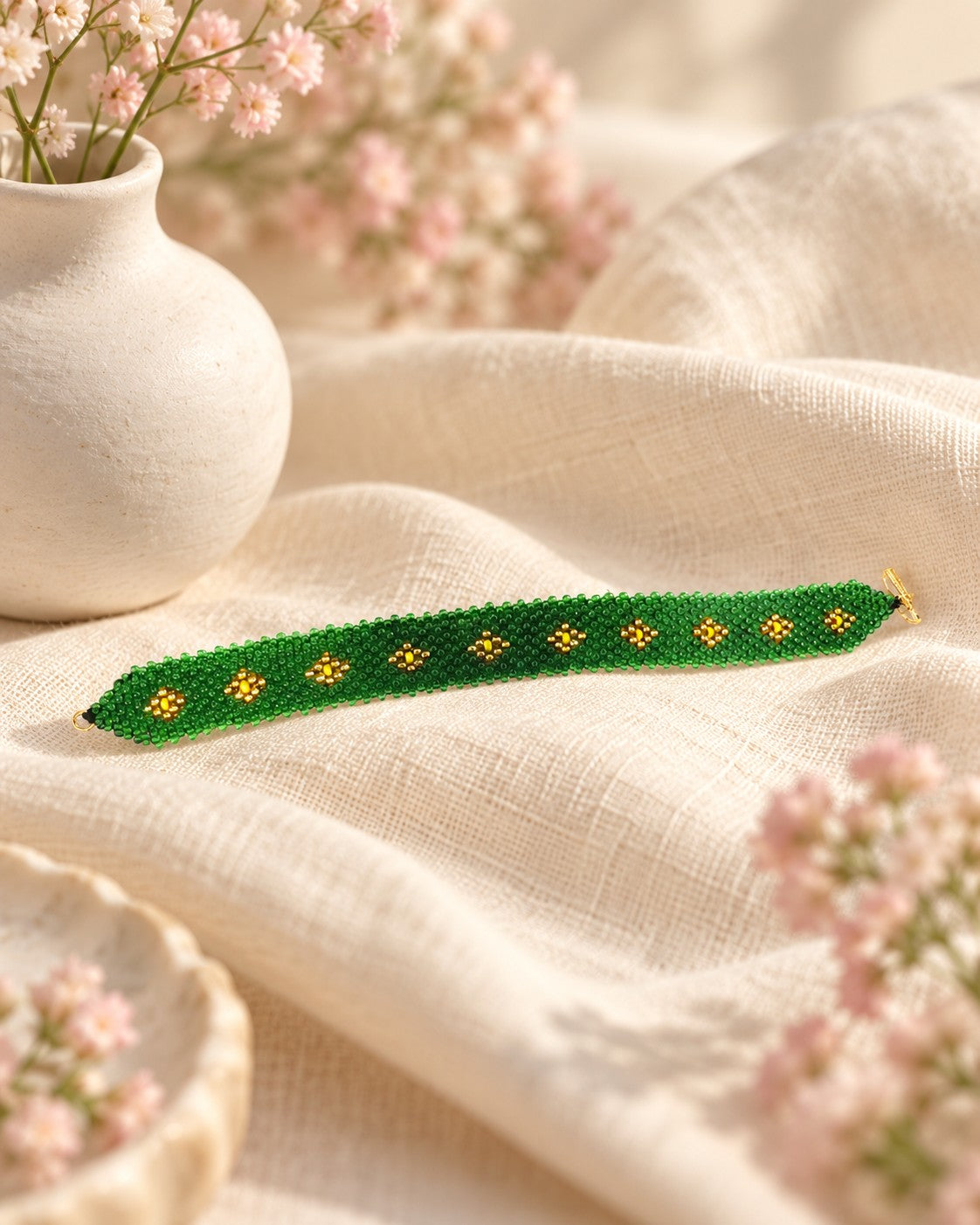 Styled image: Sona Green Beaded Bracelet on linen