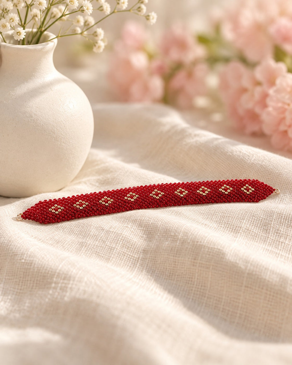 Styled image: Sindoori Red Beaded Bracelet on linen