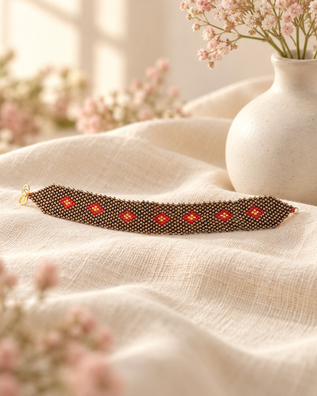 Styled image: Sindoori Beaded Bracelet on linen
