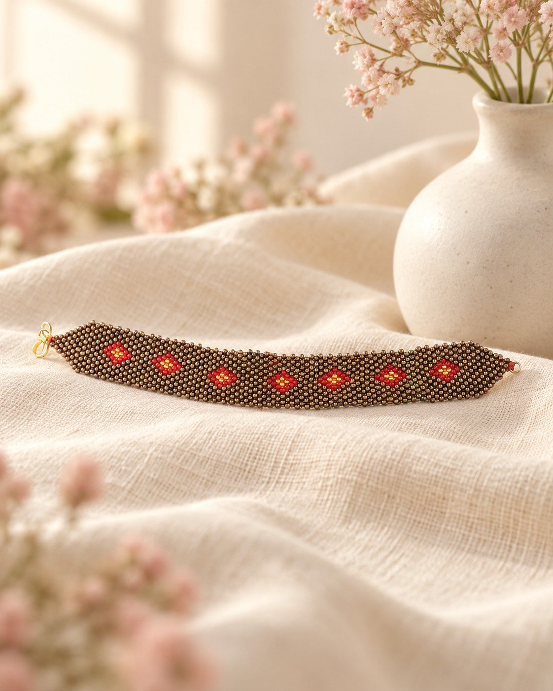 Styled image: Sindoori Beaded Bracelet on linen