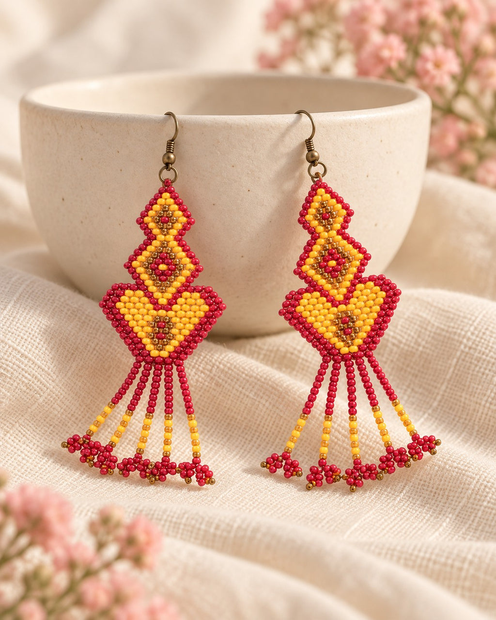 Styled image: Rangrez Geometric Beaded Earrings on a ceramic bowl