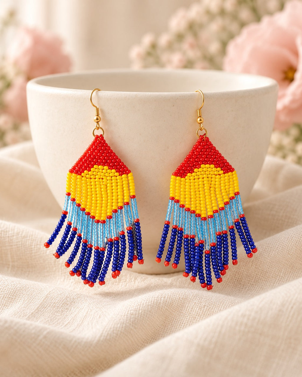 Styled image: Rangrez Geometric Beaded Earrings on a ceramic bowl