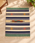Handwoven Punja durrie styled in a room