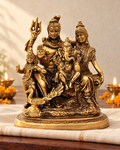 Styled image: Shiv Parivar Brass Idol on ivory handloom with Diwali diyas
